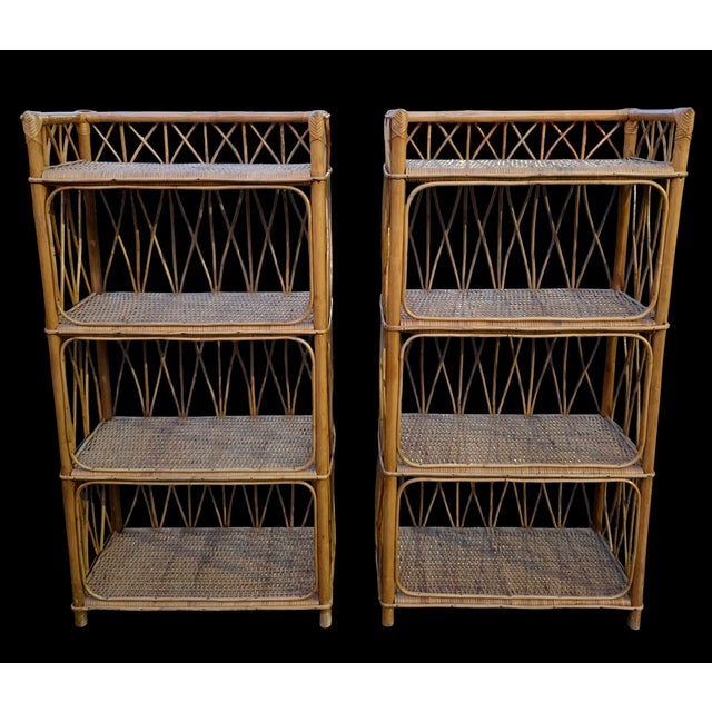 Featured is a Pair of Mid-century Bamboo and Rattan Four-Shelf Etageres. Crafted from warm-toned wicker, these slender...