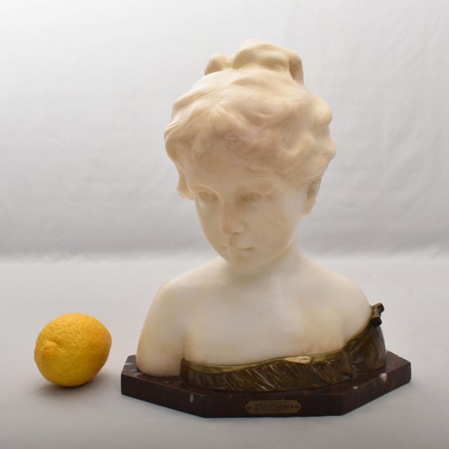 The category Antique Marble and Alabaster Sculptures presents a decorative alabaster sculpture depicting an elegant female...