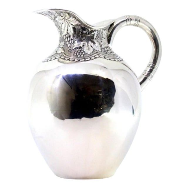 Rounded Water Jug with Raised Bunches of Grapes For Sale