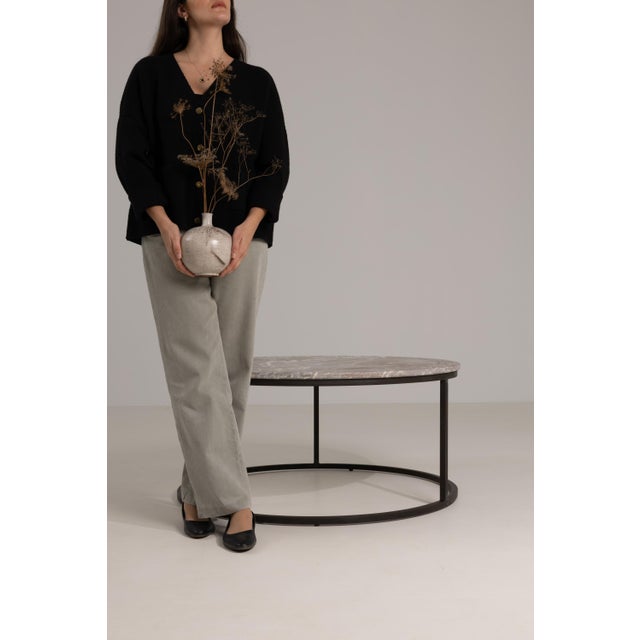 Rendered in the refined tradition of late nineteenth-century French design, this exceptional coffee table speaks to the...