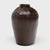 This large ceramic jar is a vintage Chinese wine vessel from the early 20th century, originally used for aging wine and...