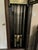 A handsome vintage Herschede Hall grandfather clock featuring a beautifully proportioned walnut case with arched bonnet...