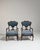 A decorative pair of Louis XV style armchairs featuring curved lines and refined proportions rooted in Rococo design. The...