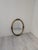 Oval Mirror in a Gilded Frame – Roses, Baroque Style A striking oval mirror in a decorative, gilded frame, designed in a...