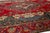 1930s This Vintage Handmade Persian Tabriz Wool Rug in a Rich Red With a Rosette Motif For Sale - Image 5 of 10