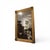 A 19th-century French Louis Philippe antique mirror featuring a gilded frame with elegant ripple detailing. The warm...