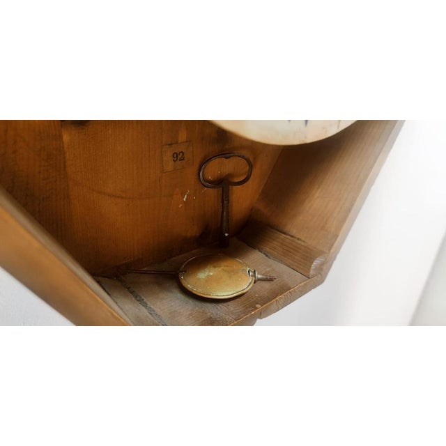 Vintage Wall Clock in Wood, in Very Good conditions. Designed 1950 to 1959