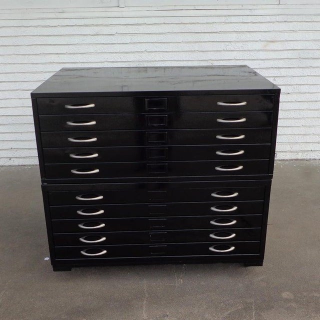 Vintage black architectural drafting flat file cabinets Restored in a gloss black. 10 drawers with chrome pulls.