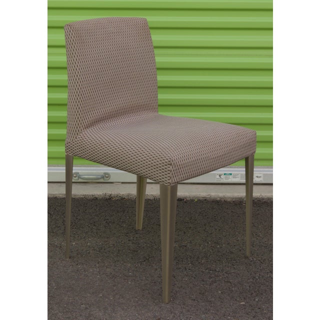 Offered here is a elegant set of four B&B Italia Melandra dining side chairs, designed by the legendary Antonio Citterio....