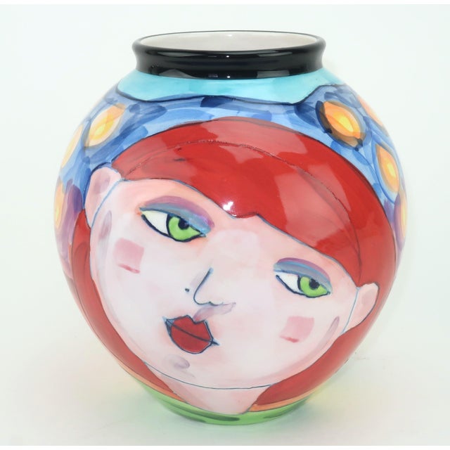 Short, round and adorable with a definitive 1980's vibe...this Denise Ford hand painted ceramic vase is decorated with the...