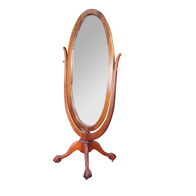 Antique Victorian Cheval Dressing Mirror. Made from mahogany with a wishbone stand featuring New York Ball & Claw Feet....