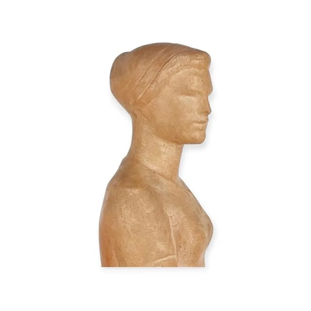 Terracotta statue made by a Hungarian artist Gyula Palotai around the 1970s. It is a simple and clean work. Marked....