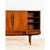 This sideboard was handcrafted in Denmark by specialist in high-end furnitures. the sideboard has a vibrant teak grain,...