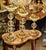 This elegant set of three French style candlestick holders features sparkling faceted crystal elements paired with richly...