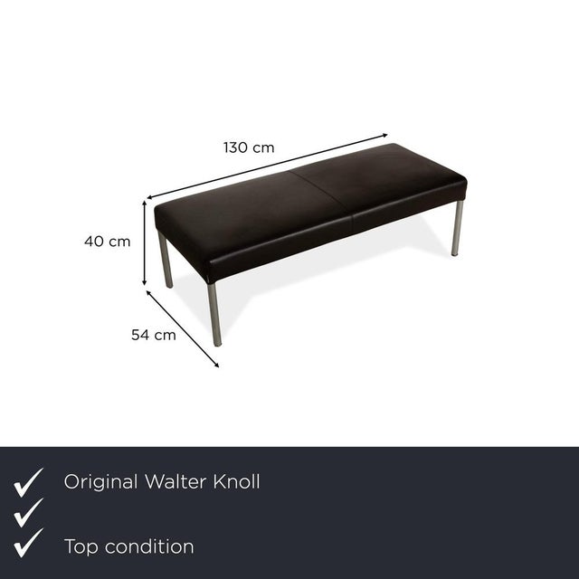 The stool by Walter Knoll is upholstered in brown leather and stands on round metal feet. It is characterized by its...