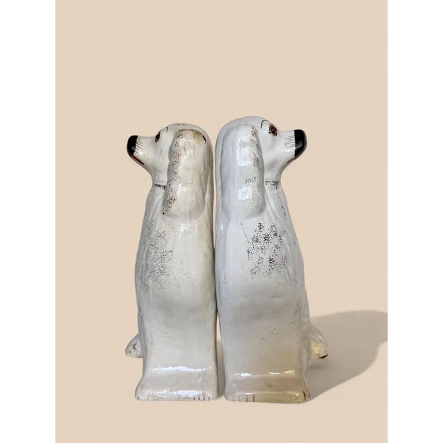 Pair of Vintage Danish Porcelain Dogs A beautiful pair of porcelain dog figurines, brought from Denmark. Dimensions: •...