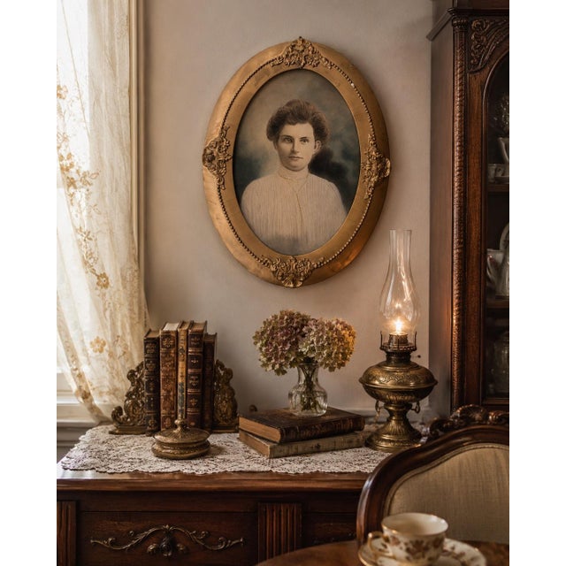 A striking late 19th-century Victorian portrait depicting an elegantly dressed young woman, presented beneath convex glass...