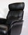 Lounge chair upholstered in black leather with aluminum swivel base from the 1970s. This lounge chair from the 1970s is...