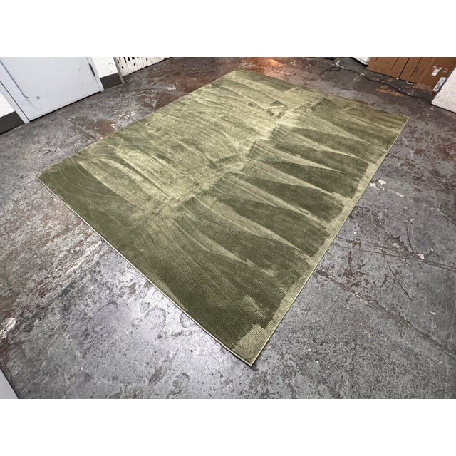 Design Plus Gallery presents the 8 Ft X 10 Ft Revive Collection Area Rug from Safavieh. This modern rug is presented in a...