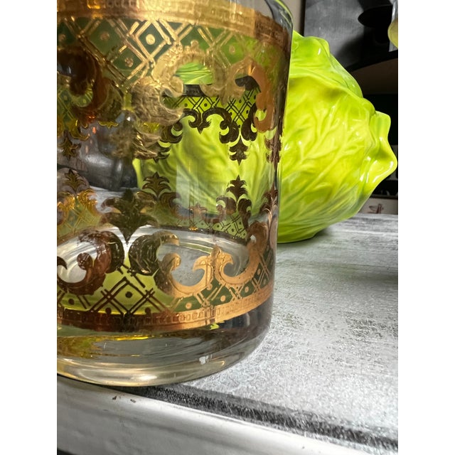 Up for consideration is a beautiful vintage 22kt gold culver lowball cocktail glass. This would look lovely in your home,...