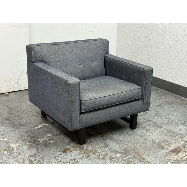 Design Plus Gallery presents the Andre Chair from Room & Board. This upholstered chair is covered in gray fabric and has a...