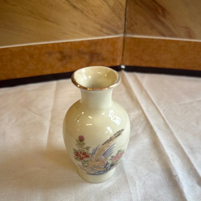 Up for consideration is a beautiful vintage miniature white ceramic Asian style vase with floral details. This would look...
