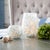 Bring a touch of coastal charm to your home with the Painted Glass Candle Holder Vase Set. Featuring cool blue and white...