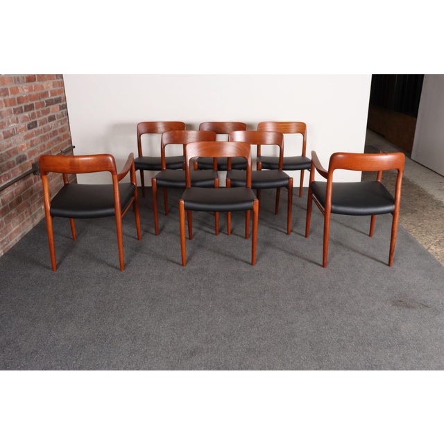 Set of eight dining chairs (two captains model #56 and six side model #75) in teak designed in the 1950s by Niels Ole...