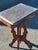 The product is an antique 19th century American walnut marble side table, fully assembled with a brown color and Victorian...