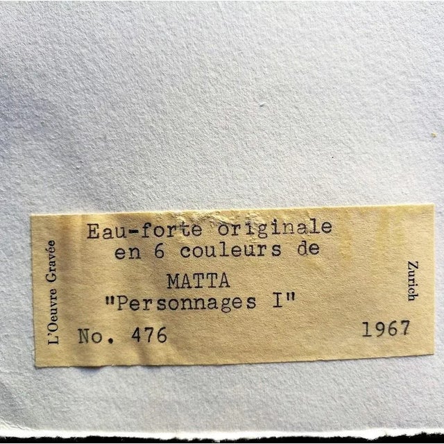 Personnages I is a very beautiful artwork realized by Roberto Sebastián Matta in the 1970s. The lithograph is hand-signed...