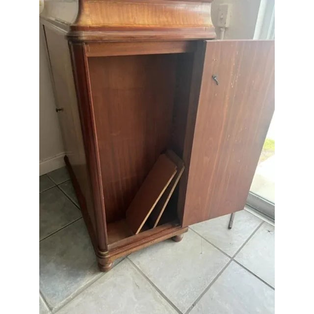 This is a very nice antique French Cupboard with 0ne door to the center and a door either side. Condition is OK consistent...
