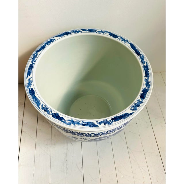 Vintage 80's extra large blue and white planter with dragon and waves pattern modeled after the Chinese Qing Dynasty....