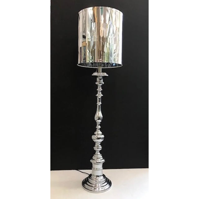 A chic Italian 1970s chrome floor lamp with custom shade. Made in the style of a turned wood candlestick but in chrome....
