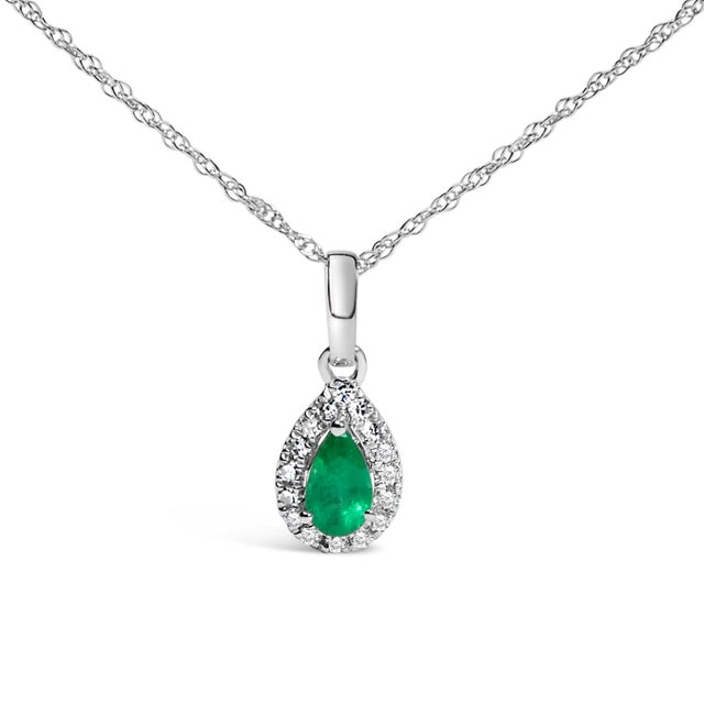 Drape elegance around your neck with this enchanting 10K white gold pendant necklace, where a luscious pear-shaped green...