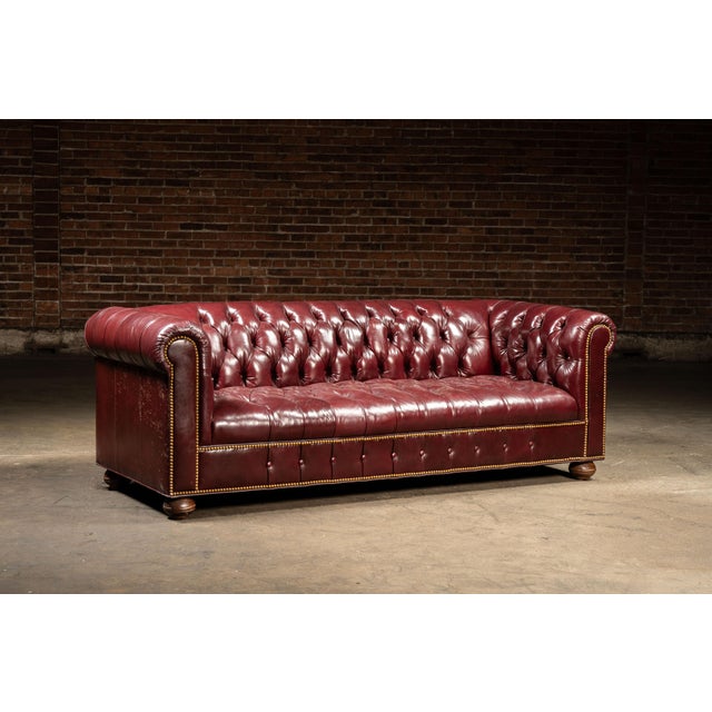 English Vintage Deep Red Leather Tufted Chesterfield Sofa With Brass Nailhead Trim For Sale - Image 3 of 9