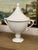 Design Plus Gallery presents a Large White Ceramic Lidded Urn from Bassett Furniture. This Neoclassical-inspired urn...