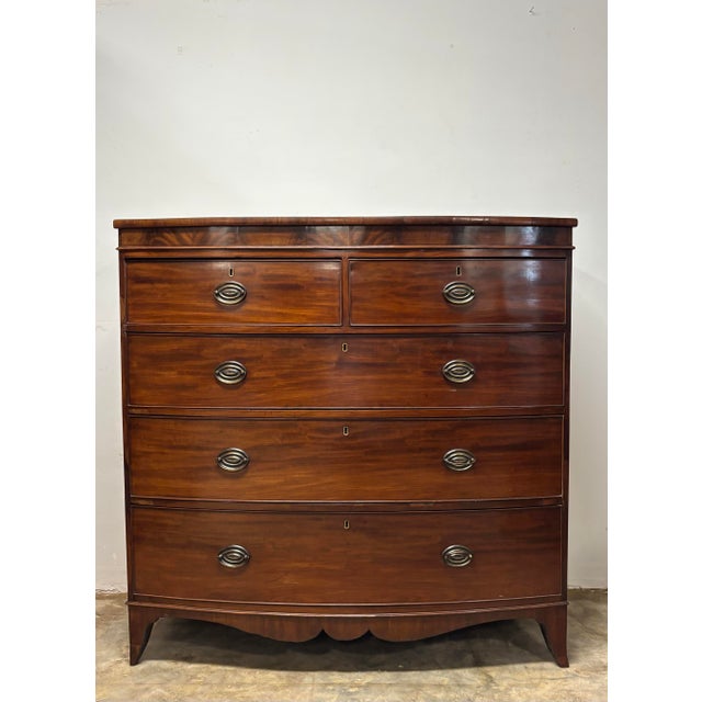 There is a quiet refinement to a bow front chest — a softness of line that feels both elegant and entirely at ease. This...