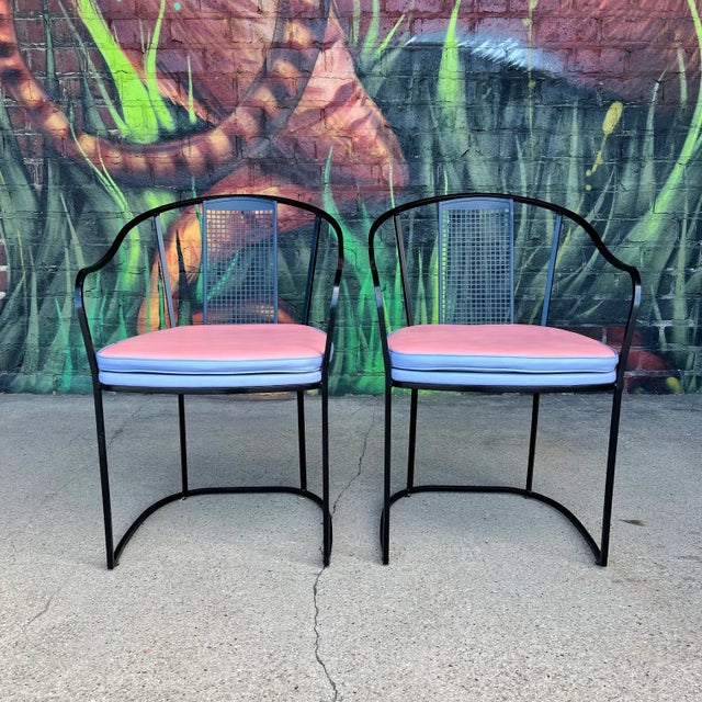This is a rare and unique set of 6 80s postmodern iron patio chairs. They feature an upholstery blue seat base and a...