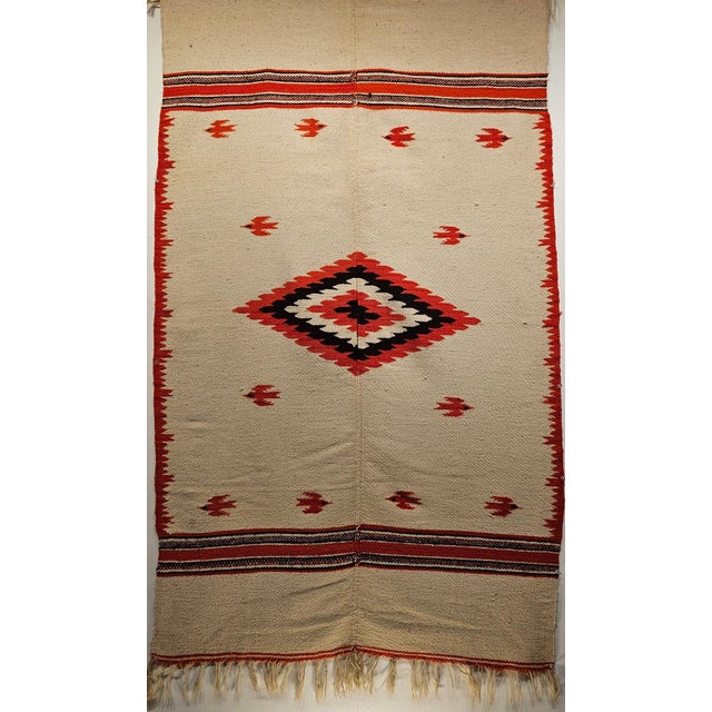 3’ 6” x 6’ 2” Vintage Mexican Serape Saltillo Kilim Rug in cream color. A beautiful Serape kilim blanket rug was woven in...