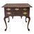 This is a timeless Queen Anne style carved mahogany low boy or chest. It has a scalloped valance with two hanging finials....