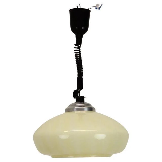 Extendable (extends up to 156cm) vintage chandelier, made in former Czechoslovakia, in the 1970's. Made of chrome, metal...