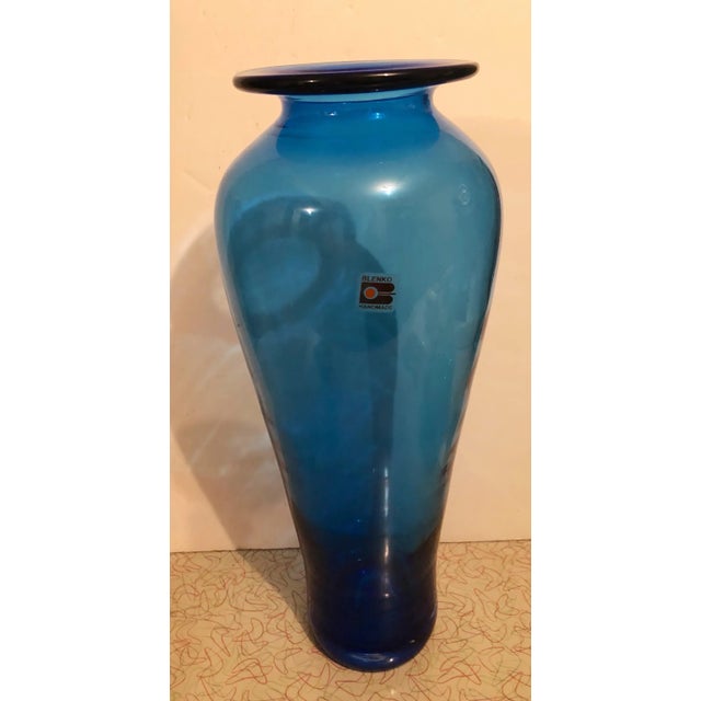 Very nice Blenko tapered blue glass vase- nice condition- 16” tall and at its widest about 7”. The mouth at the top is 5”-...