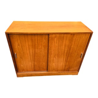 Mid Century Danish Modern Brown Walnut Sliding Door Cabinet. For Sale