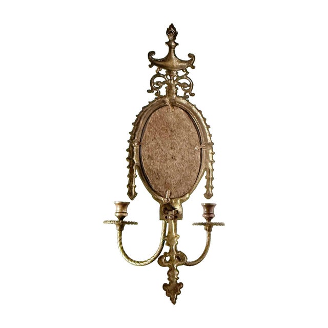 Pair of vintage solid brass Japanese Hollywood Regency mirrored wall sconces. Circa 1940's. Two arm candle holders and...