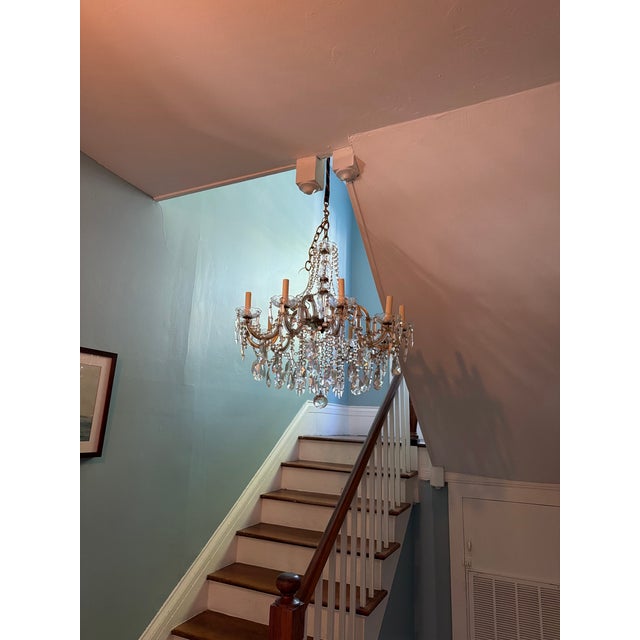 Mid 20th century Maria Theresa chandelier. Unknown origin. Needs a good cleaning. If you have an idea of more details, I...