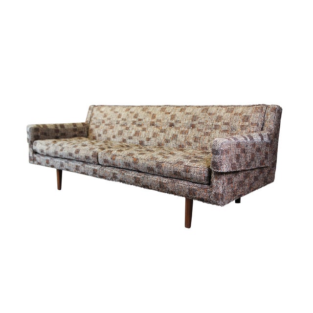 Edward Wormley for Dunbar Atomic Era Bracket Back Sofa, circa 1950s. Features streamlined track arms, original tweed plaid...