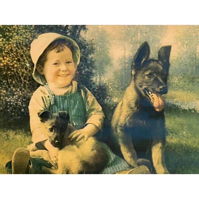 Framed Chromolithograph of a boy and his dog "Pals" by Alfred Guillon.