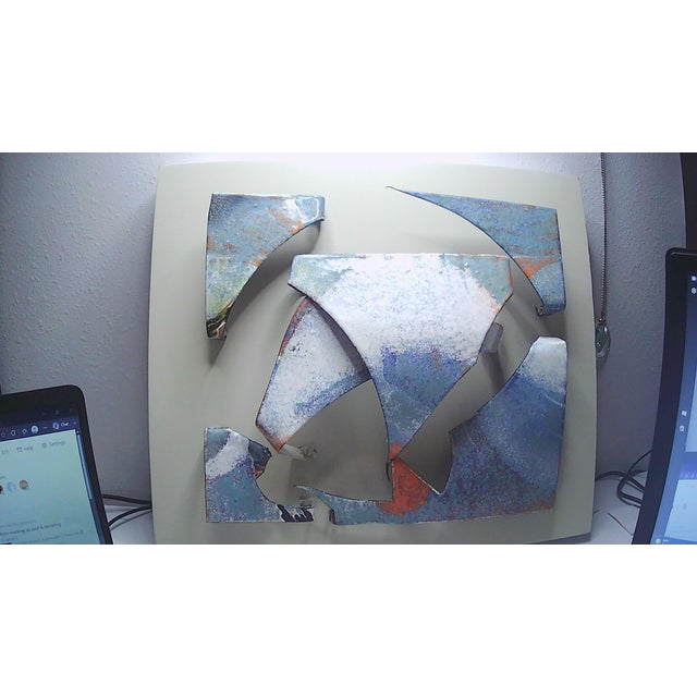 This unique 3-D metal wall art collage by artist K Parson combines elements of MCM brutalist abstract style with a mixed...