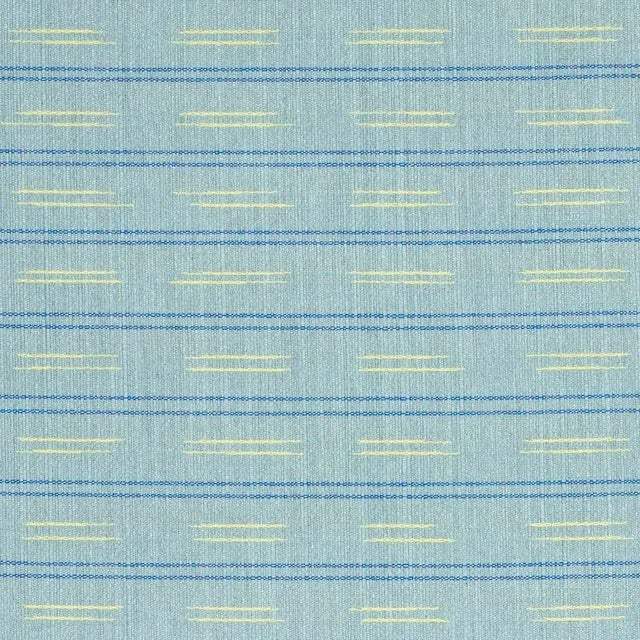 This high-performance woven ikat stripe with a soft, supple hand has a melange ground and the handmade feel of an antique...