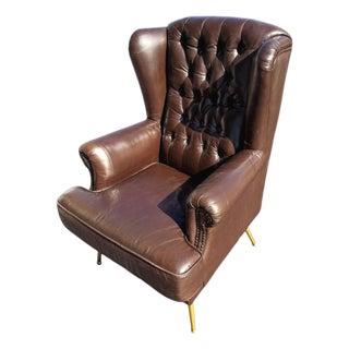 The Epitome of Mid-Century Prestige: Rare Vintage Rubelli Leather Wingback Chair For Sale